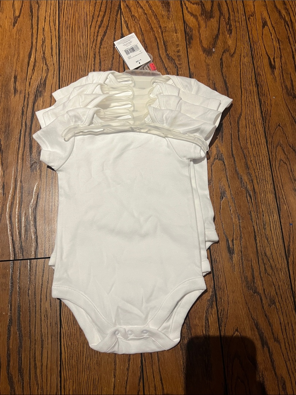 White Short-Sleeve Baby One-Piece Bodysuit - Pack of 4